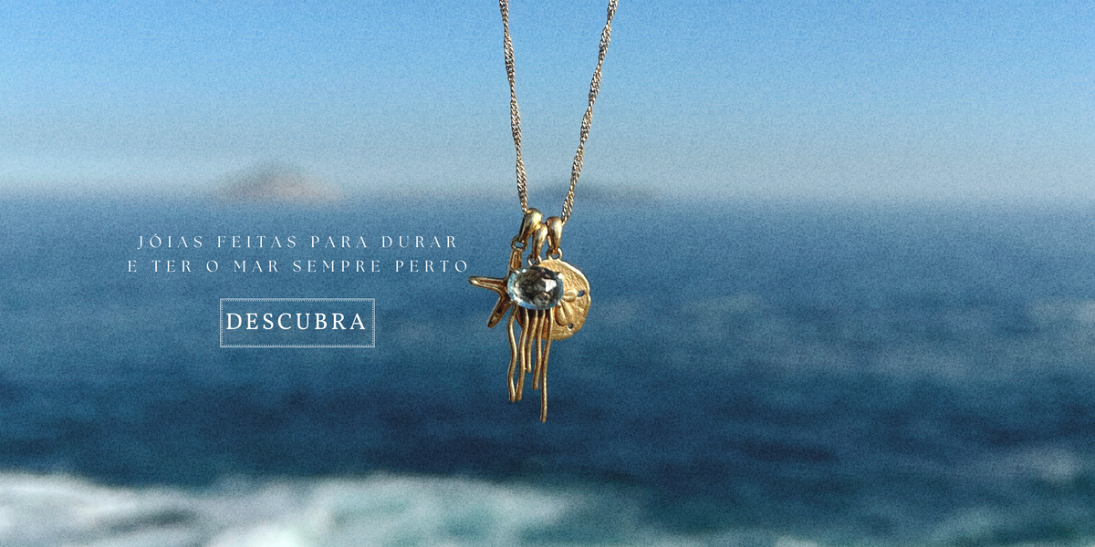 Colar com água viva, bolacha do mar e estrela do mar.